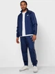 Спортивний костюм Nike M Nsw Ce Trk Suit Wvn Basic BV3030-410 XL (193146353762) - зображення 1