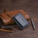 Маленьке горизонтальне портмоне з натуральної шкіри ST Leather Чорне (bg193fash56) - зображення 10