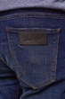 Джинси Wrangler Larston Slim Tapered (W18SRS24N) Темно-синій 29-34 - зображення 4