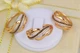 Кольцо Xuping Jewelry с черными и белыми мелкими фианитами р 18 золотистое - изображение 1