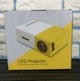 Проектор портативний міні LED Magnus YG300 з динаміком 400-600 Лм (MP3, WMA, OGG, ACC, FLAC, APE, WAV) - Жовто-білий - зображення 5