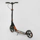 Детский двухколесный самокат Best Scooter 79740 со складной конструкцией, передним амортизатором и фарой, Оранжевый - изображение 6