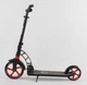 Самокат двухколесный Best Scooter от 6 лет с амортизацией черный с оранжевым 61711 - изображение 3