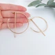 Круглые серьги джекеты DeKolie ER0036 золотистые - изображение 3