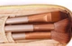 Набір пензлів для професійного макіяжу Urban Decay Neked2 12 шт у пеналі золотистий - зображення 4