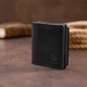 Вертикальне глянсове портмоне з накладною монетницьою GRANDE PELLE 11329 Чорне - зображення 2