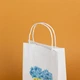 Пакет подарочный с патриотическим рисунком eko-kraft 150*90*240 10 шт/уп Крафт пакет украинской символикой Сердце желто-голубого цвета в цветочки Маленький упаковочный пакетик - изображение 5