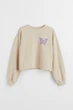 Світшот бежевий Butterfly H&M 170см (40008016) - зображення 1