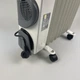 Масляний обігрівач NIKURA НY-C3F-9 2000W 9 секцій, з конвекцією повітря, білий - зображення 8