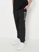 Спортивные брюки детские Joma Suez 9016P13.10 153-164 см Черные (9994578723083) - изображение 1