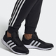 Buty do biegania po asfalcie męskie adidas Retrorunner FV7034 44 28 cm Czarne (4062059789943) - obraz 7