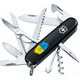 Складаний швейцарський ніж Victorinox Vx13713.3_T1026u Huntsman Ukraine 15 функцій 91 мм Трезубець фігурний на фоні прапора - зображення 1