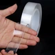 Багаторазова кріпильна стрічка - липучка для кріплення Ivy Grip Tape двосторонній скотч 5м на гелієвій основі Кріпиться на будь-які поверхні Прозорий - зображення 7