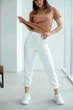 Женские спортивные штаны ONIOS Sport pants for women молочные M 983307 - изображение 1