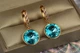 Сережки Xuping Jewelry підвіски великий камінь в обідку блакитні хамелеони 3 см золотисті - зображення 1