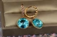 Сережки Xuping Jewelry підвіски великий камінь в обідку блакитні хамелеони 3 см золотисті - зображення 2