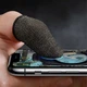 Кіберспортивні сенсорні напальчники, триггери HOCO GM4 Phantom fiber mobile game finger cots 2шт Black/Silver - зображення 2