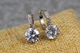 Серьги Xuping Jewelry с большим белым камнем 2 см серебристые - изображение 1