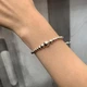Серебряный браслет для шармов Пандора "Сферы" с регулируемой застёжкой 597749 23. - изображение 2
