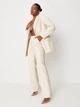 Брюки из искусственной кожи женские Missguided R9347809 38 Молочные (DN5059384327314) - изображение 4