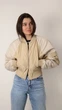 Жіночий бомбер H&M (73749) XS Бежевий - изображение 1