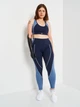 Спортивный топ для йоги женский Reebok Reebok Lux Racer Padded Colorblock GS8923 XS Vector Navy (4064057688068) - изображение 3