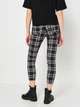Брюки женские H&M Divided 0801384 32 Черные с белым (7000000000347) - изображение 2