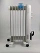 Обігрівач оливний RM Electric, 15м2, 1500Вт, мех. упр-ння, 7 секцій, зволожувач, білий - изображение 1
