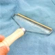 Щітка скребок для зняття катишок ковтунців Lint Rollers - изображение 6
