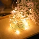 Світлодіодна гірлянда нитка РОСА на батарейках 3хАА LED 100 Крапля роси на дроті 10м, теплий-білий - зображення 7