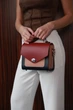 Сучасна та стильна шкіряна жіноча сумка кроссбоді Lamponi Chest one bordo/pink/darkblue - зображення 3