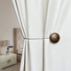 Магнітний підхоплення для штор Металік Combs круглий Бронза Adagio Windows Decor, шторні аксесуари та тримачі - зображення 1