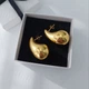 Серьги женские объемные трендовые DeKolie MK1270-1 золотистый - изображение 5