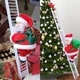 Новогодняя музыкальная механическая игрушка Дед Мороз поднимающийся по лестнице на батарейках - изображение 8