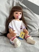 Лялька Реборн Reborn 55 см вушка зайчик силіконова NPK DOLL - зображення 5