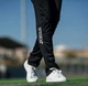 Женские спортивные штаны Joma CHAMPION IV Черный S (900450.100) - изображение 4