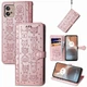 Чохол Embossed Cat and Dog для Motorola Moto G32 книжка шкіра PU з візитницею рожеве золото - зображення 1