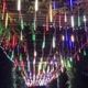 Новогодняя гирлянда "Метеоритный дождь" - набор тающих сосулек по 50 см. 8 шт. Разноцветные (Подходит для улицы). - изображение 4
