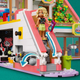 Конструктор LEGO Friends Торговельний центр у Хартлейк-Сіті 1237 деталей (42604) - зображення 9