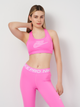 Спортивный топ для тренировок женский Nike Futura Bra FB4080-675 XS Игривый Розовый/Белый (0196976628147) - изображение 1