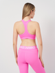 Спортивный топ для тренировок женский Nike Futura Bra FB4080-675 XS Игривый Розовый/Белый (0196976628147) - изображение 3