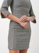 Сукня-футболка коротка осіння жіноча H&M 0724773_ч.б.астр.уз 40 Чорне з білим (KAY2000001117583) - зображення 4