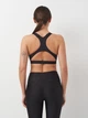 Спортивный топ для бега и тренировок женский Puma Sports Bras 52478501 XS Черный (4099686701925) - изображение 2
