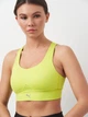 Спортивный топ для бега женский Puma Sports Bras 52507439 XS Лимонный (4099685438587) - изображение 4