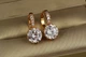 Сережки Xuping Jewelry з великим білим каменем і круглою застібкою 2 см золотисті - зображення 2