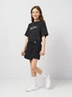 Подростковые шорты-юбка для девочки Coccodrillo City Explorer Junior WC4124502CEJ-021 164 см Черная (5904986329054) - изображение 2