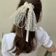 Резинка с бантом и жемчужинами Honey Fashion Accessories бежевый (12-24) - изображение 1