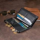 Шкіряний гаманець жіночий на хлястиці з кнопкою ST Leather 19280 чорний - зображення 10