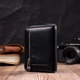 Кожаный женский кошелек на молнии с металлическим логотипом производителя ST Leather 19483 черный. - изображение 7