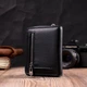 Шкіряний гаманець для жінок на блискавці з тисненим логотипом ST Leather 19489 чорний - зображення 7